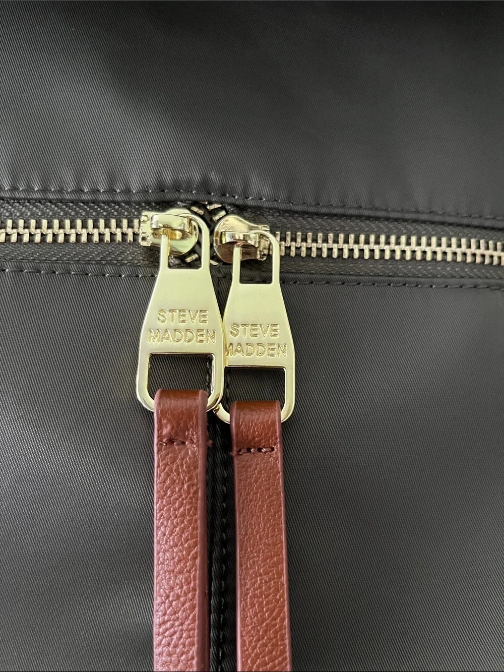 Steve Madden dark green backpack purse with change purse.